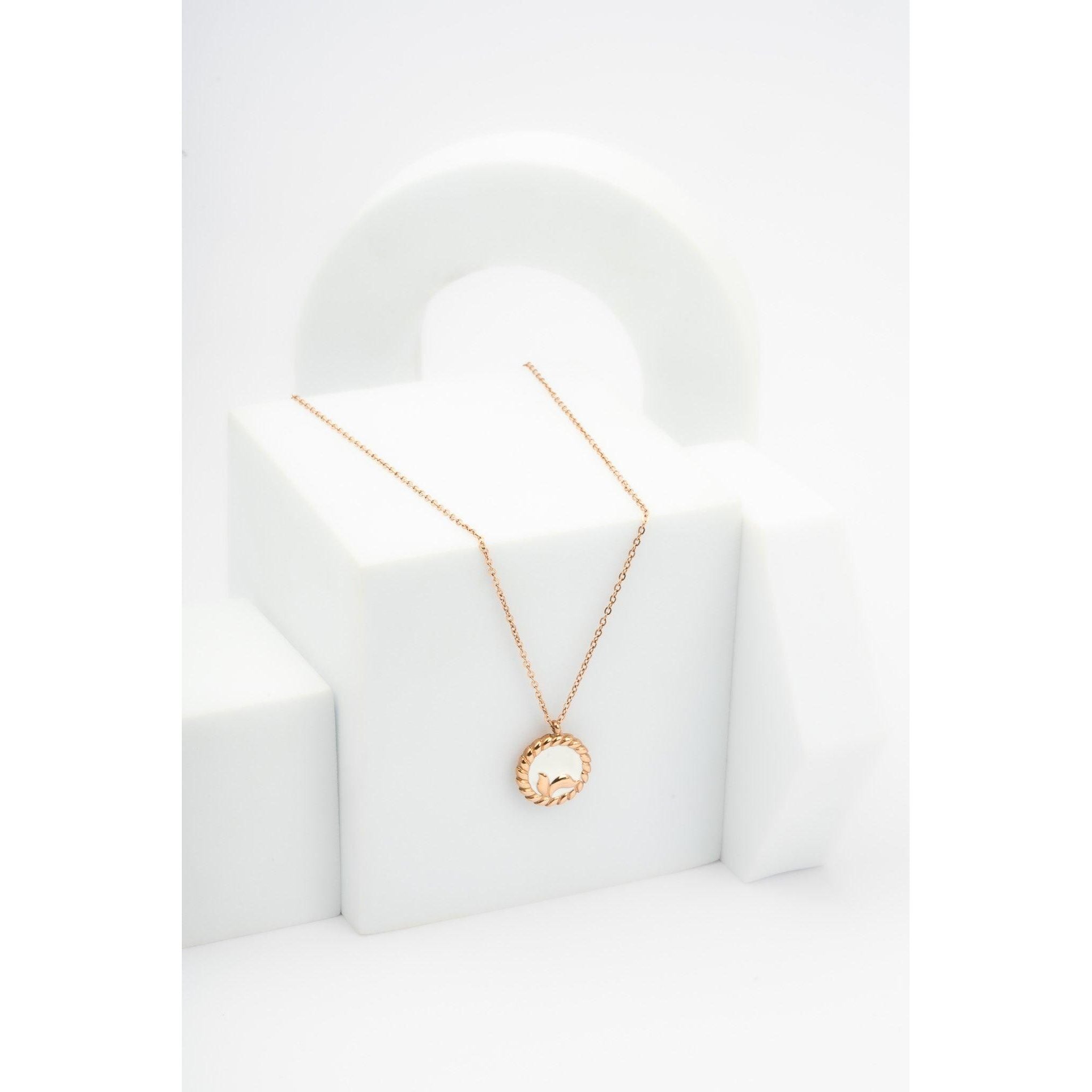 White mermaid chain with golden tone circle and stainless steel