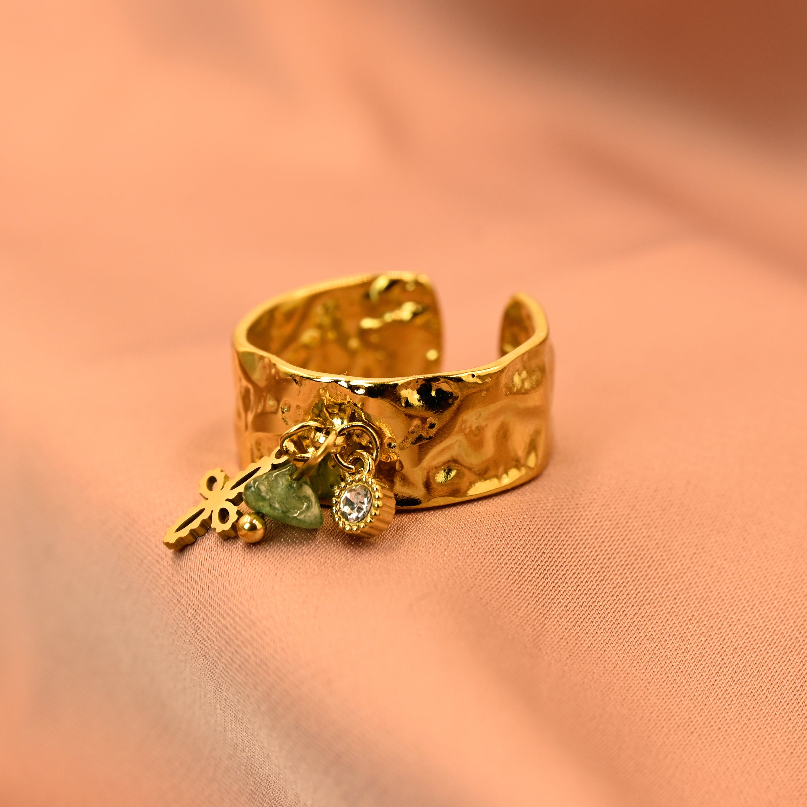 The curshed gold charm ring
