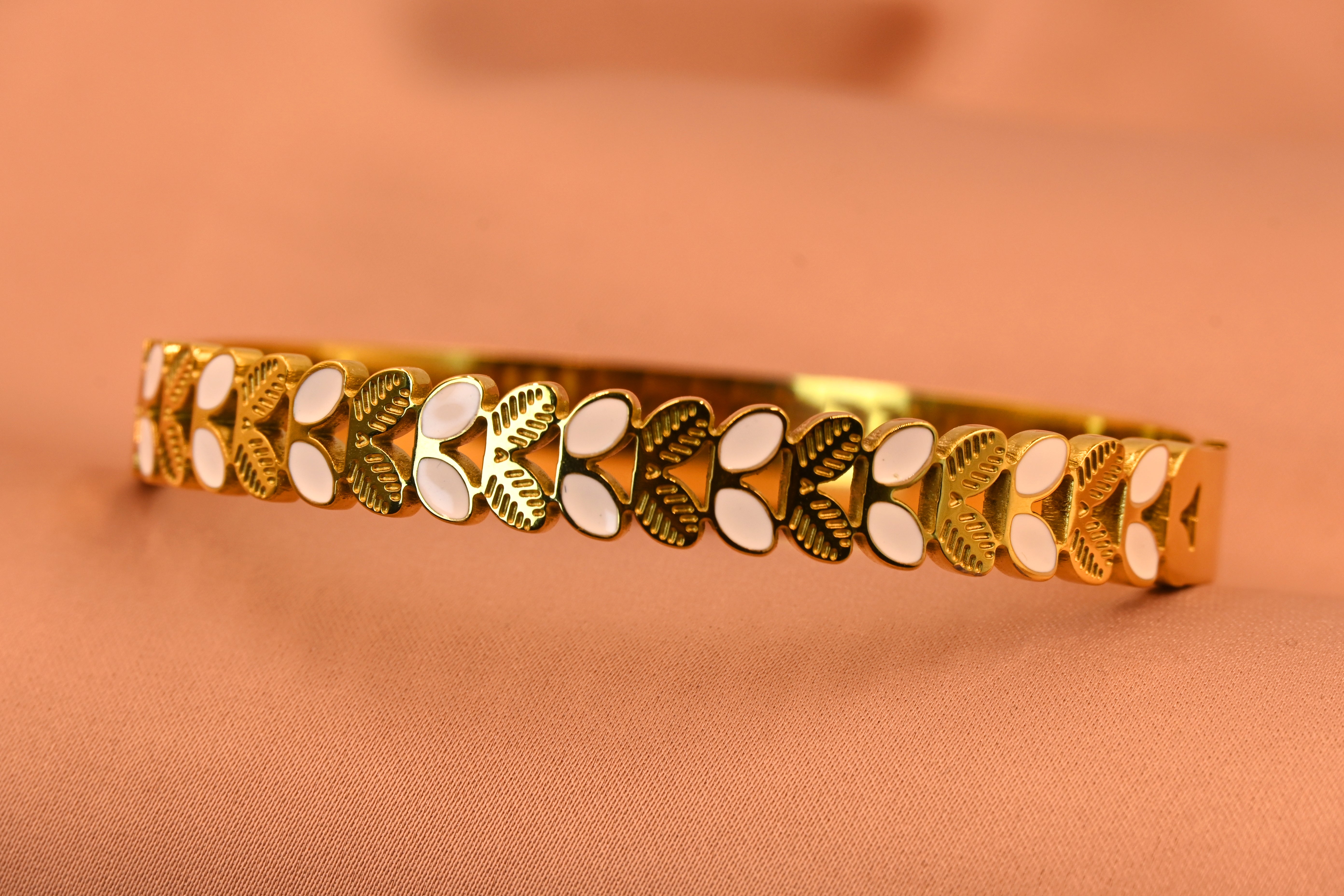 Kanak Pushp Bracelet | Floral Leaf Motif Gold Kada with White Detailing